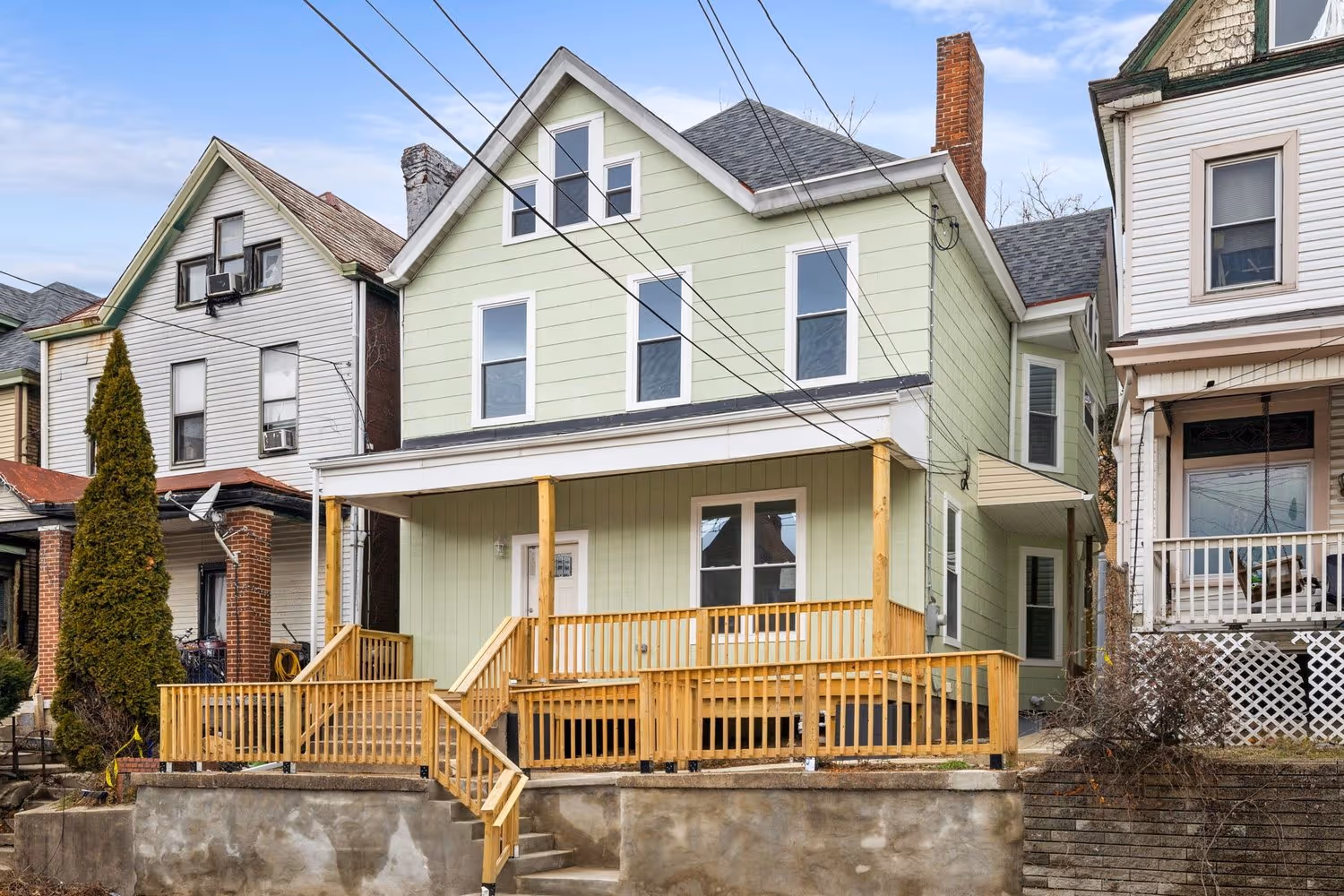 240 Kennedy after renovation, with its rebuilt front porch