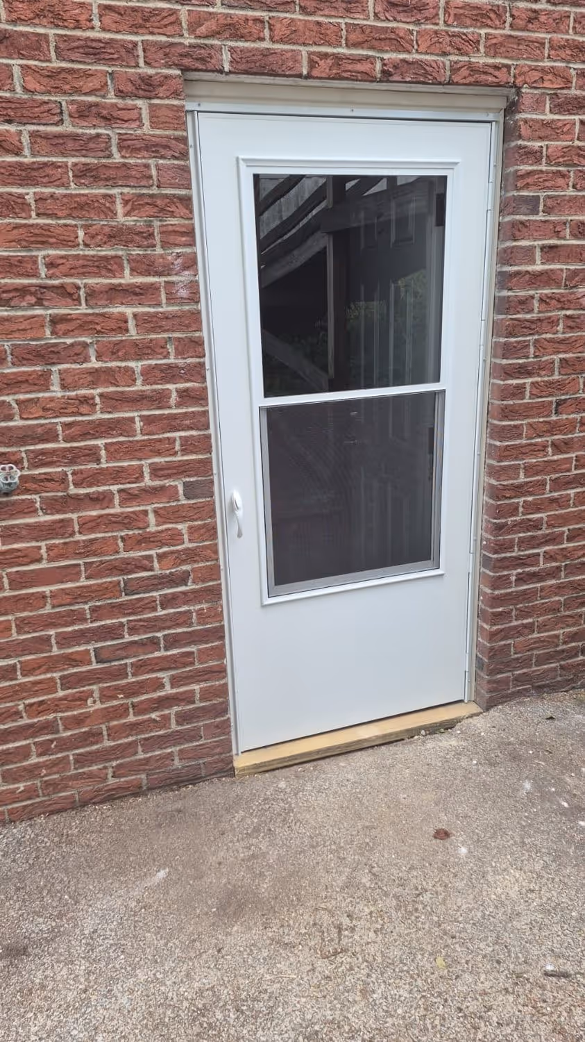 Library, after: weatherization new screen and exterior garage door