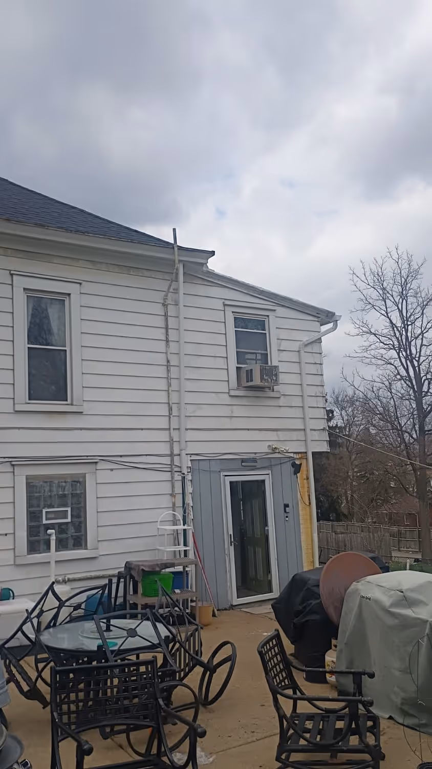 Margray, after: new gutter and downspout